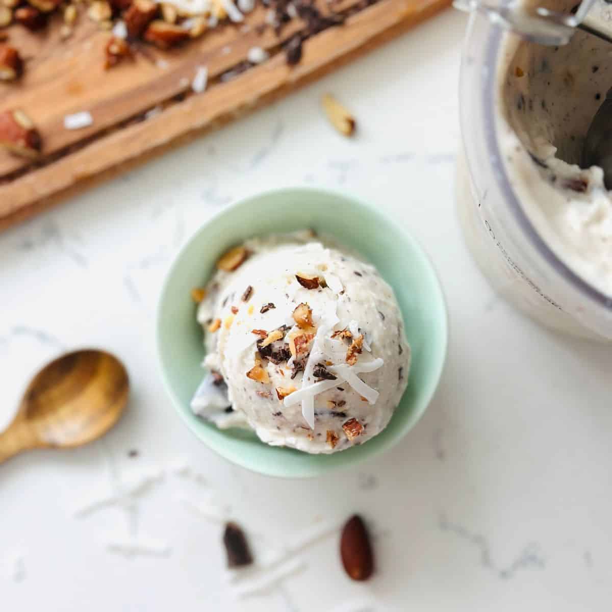 Scoop of almond joy ice cream made using ninja creami.