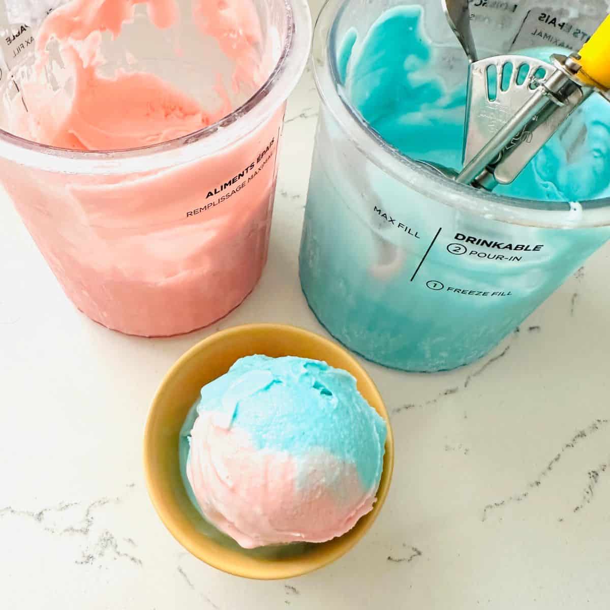 Scoops of cotton candy swirl ice cream ready to be enjoyed.