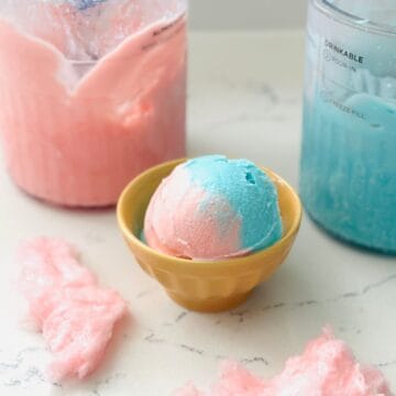 Scoops of cotton candy swirl ice cream ready to be enjoyed.