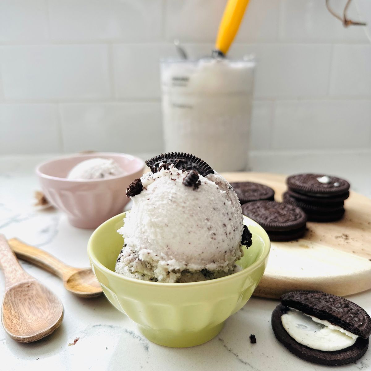 Scoops of Oreo Ice Cream in a bowl ready to be enjoyed.