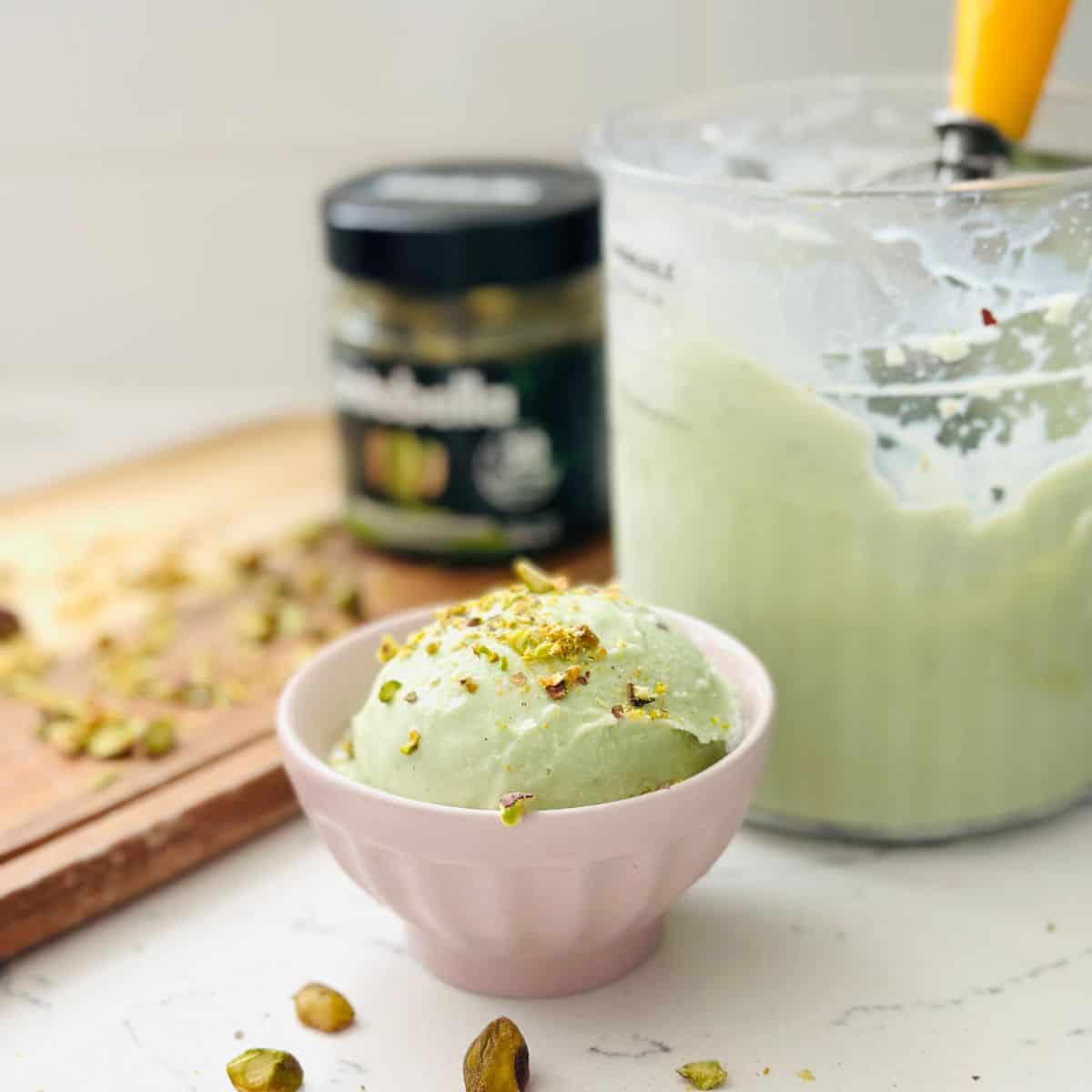 Scoops of pistachio ice cream in a bowl ready to be enjoyed.