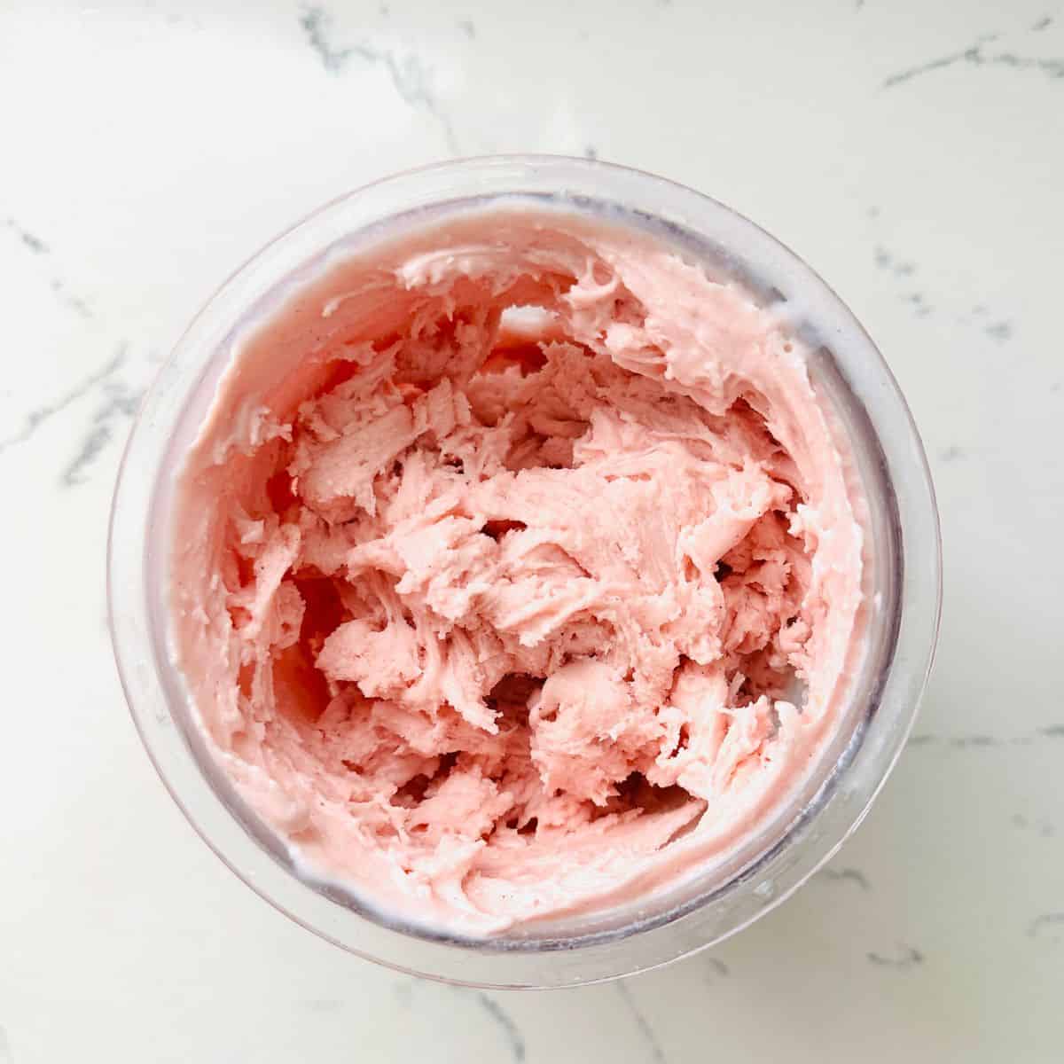 Freshly spun rose raspberry ice cream mixture.