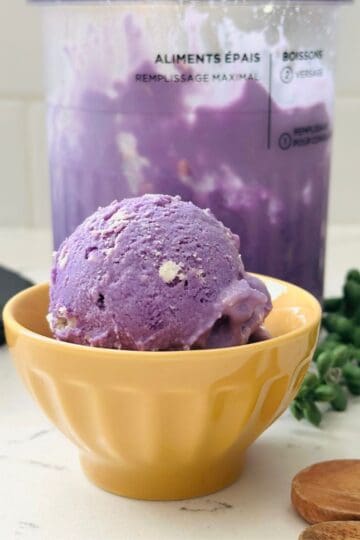 Scoop of Ube Cheese Ice Cream in a bowl ready to be enjoyed.