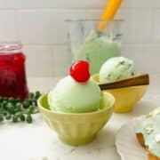 Scoops of shamrock ice cream in a bowl ready to be enjoyed.