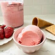 Scoops of strawberry cheesecake ice cream ready to be enjoyed.