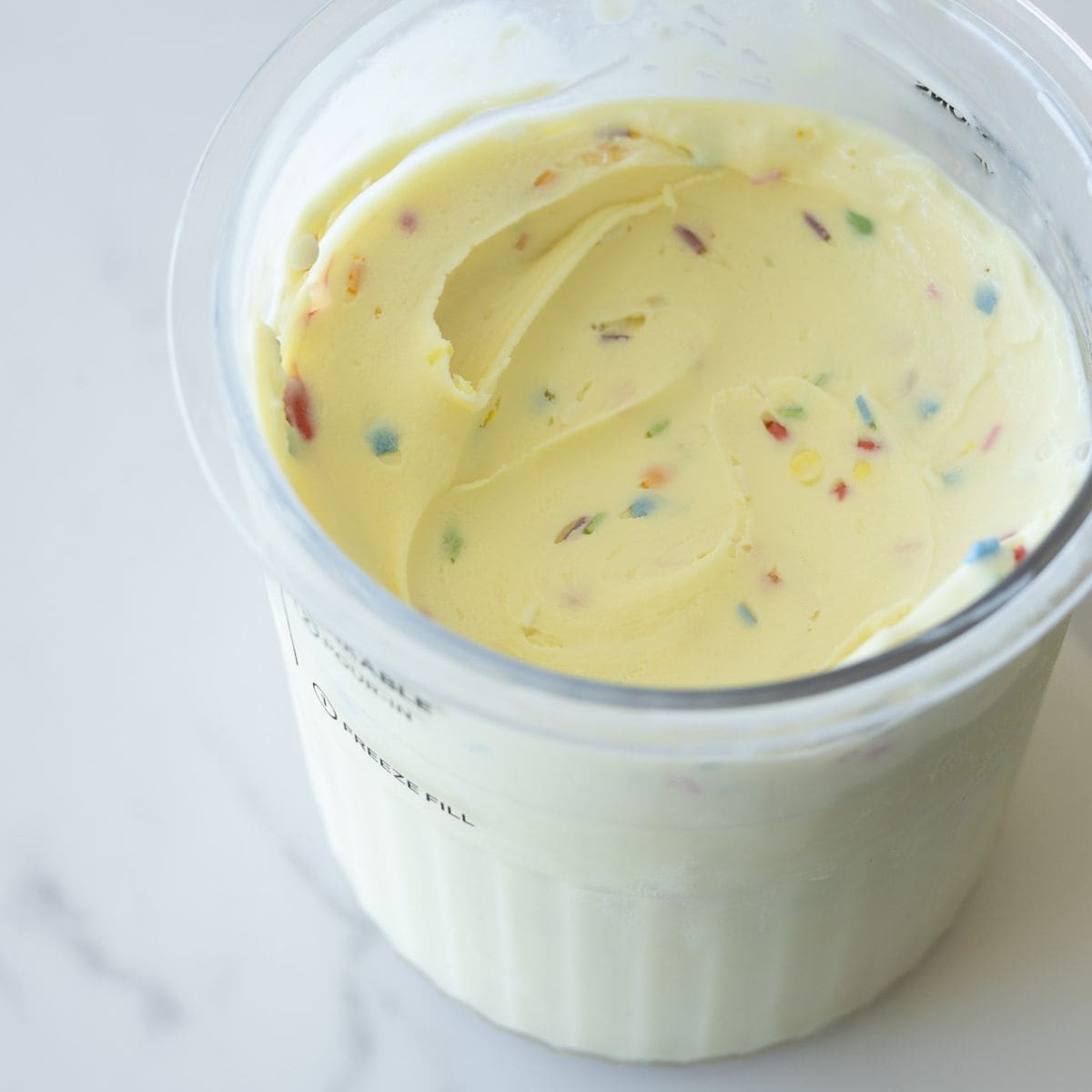 Homemade birthday cake ice cream made with the Ninja Creami, featuring a creamy texture, rich vanilla flavor, and colorful sprinkles for a festive treat.