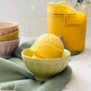 Scoops of homemade mango sorbet ready to be enjoyed.