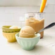 Salted caramel ice cream served in a small bowl with a creamy texture.