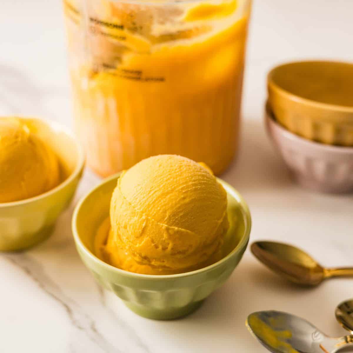 Creamy 3-ingredient mango ice cream made with fresh mangoes, sweetened condensed milk, and half and half.