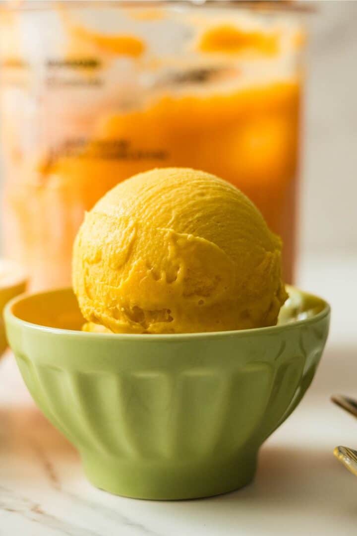 Creamy 3-ingredient mango ice cream made with fresh mangoes, sweetened condensed milk, and half and half.