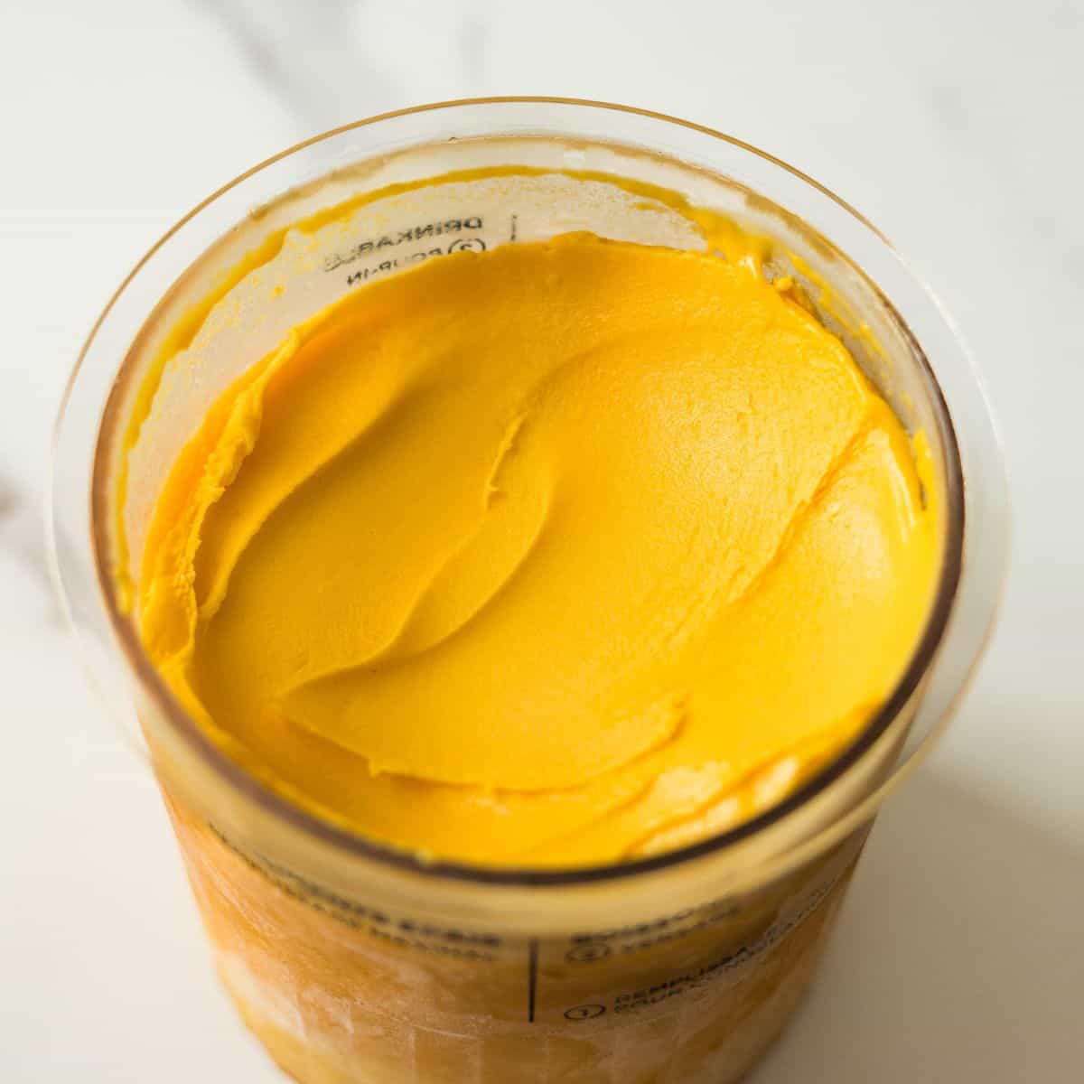 Creamy 3-ingredient mango ice cream made with fresh mangoes, sweetened condensed milk, and half and half.