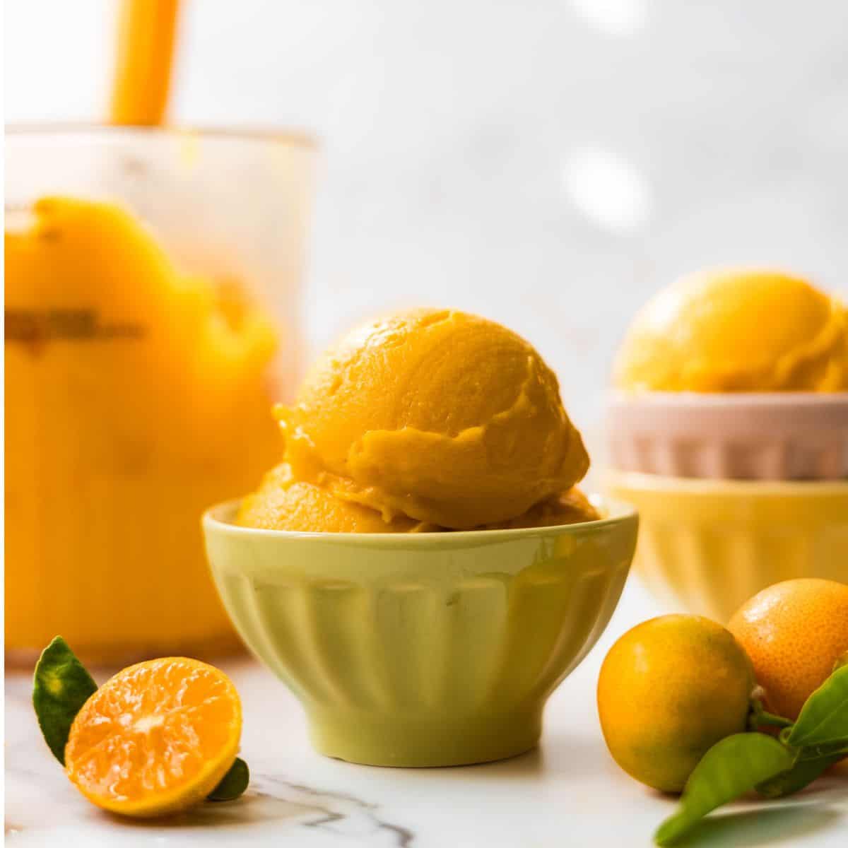 Ninja Creami mango and calamansi sorbet in a bowl ready to be enjoyed.