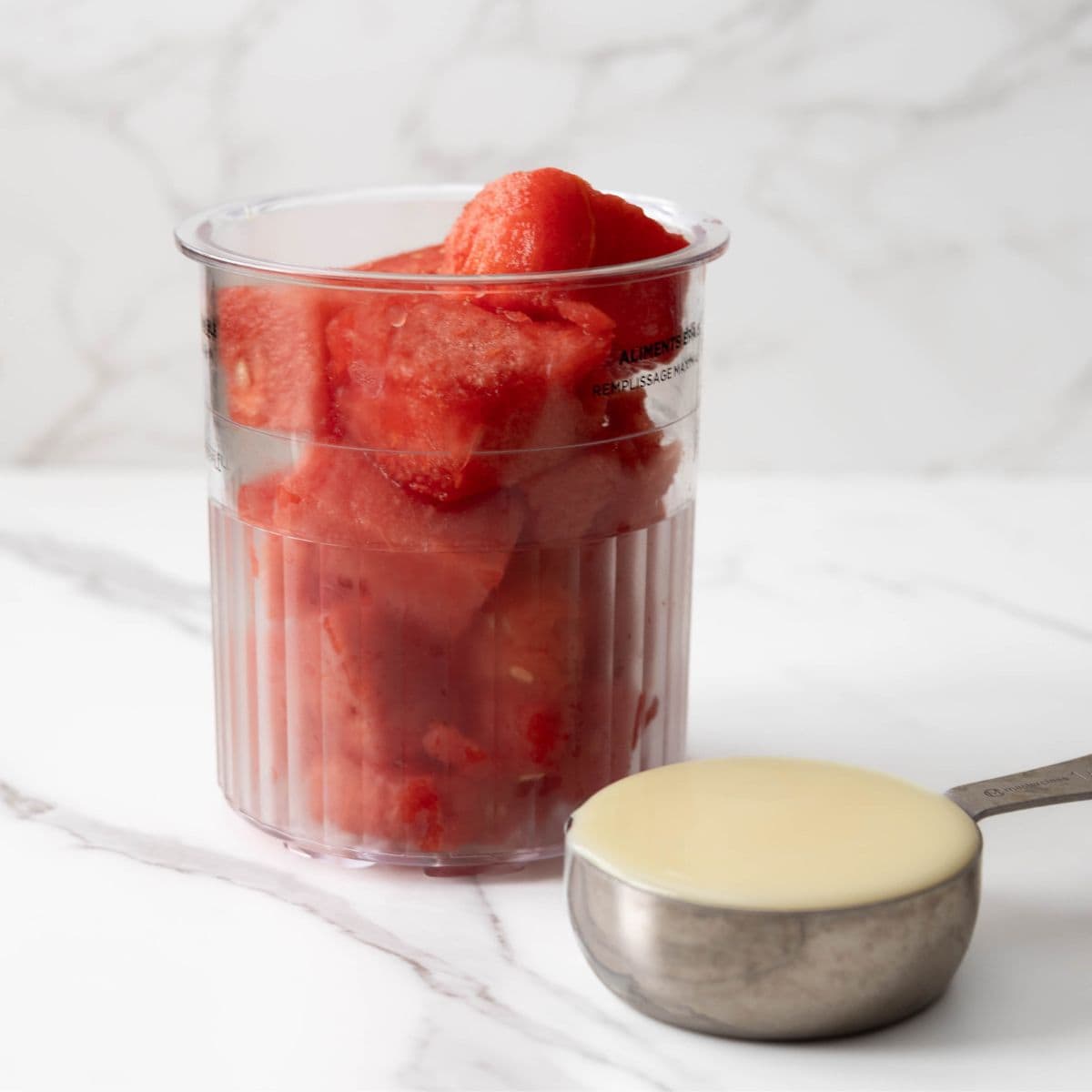 Ingredients for NInja Creami strawberry ice cream.
