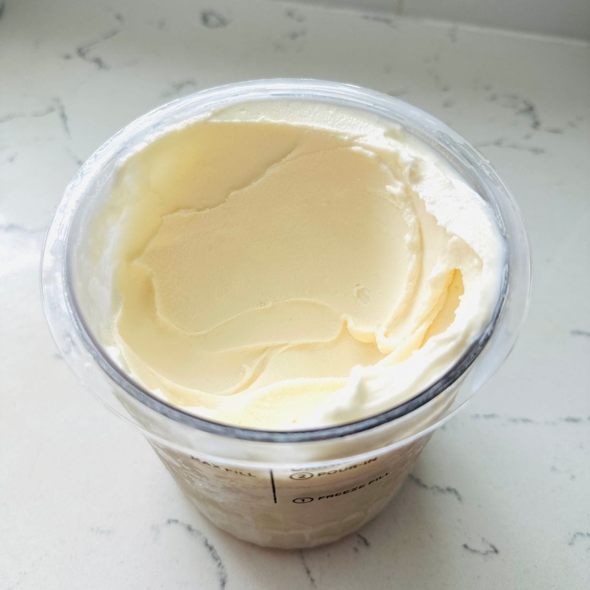 Creamy Ninja Creami Yakult ice cream after spinning.