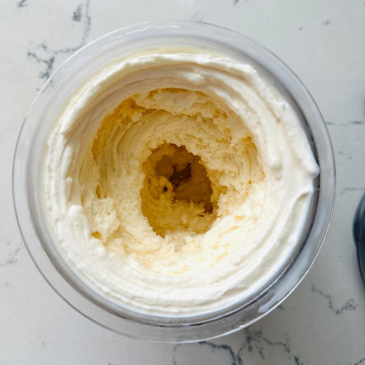 Creamy Ninja Creami Yakult ice cream after spinning.