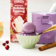 Creamy Ninja Creami ube eggnog ice cream in a bowl ready to eat.