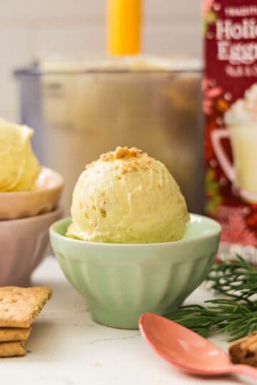 Creamy eggnog ice cream with graham crackers as mixins in a bowl ready to be enjoyed for holidays.