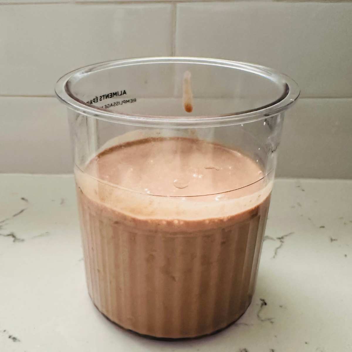 Ninja Creami chocolate strawberry ice cream mixture ready for freezing.
