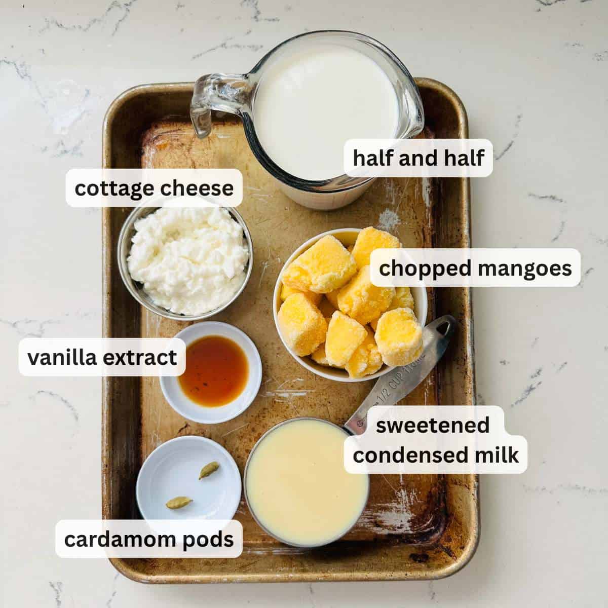 Ingredients for Mango Cardamom ice cream.