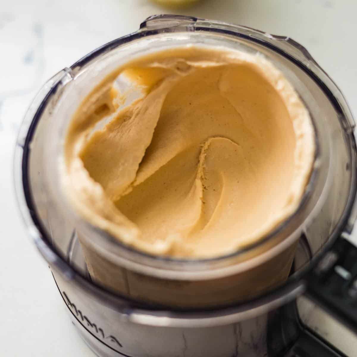 Chai Tea Latte ice cream mixture on a Ninja Creami pint showing creamy texture.