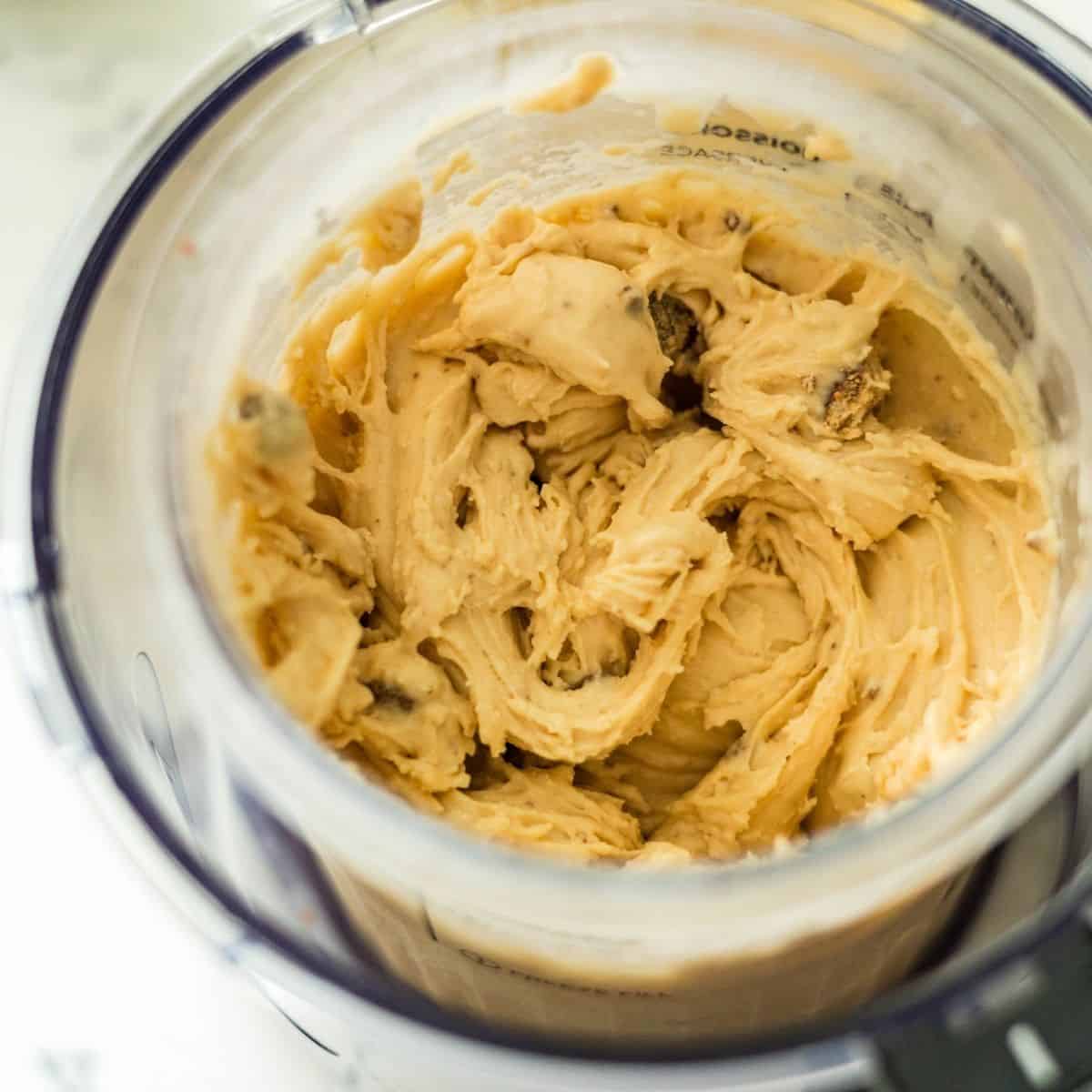 Ninja Creami peanut butter cup ice cream after re-spin with chopped peanut butter cup pieces mixed throughout