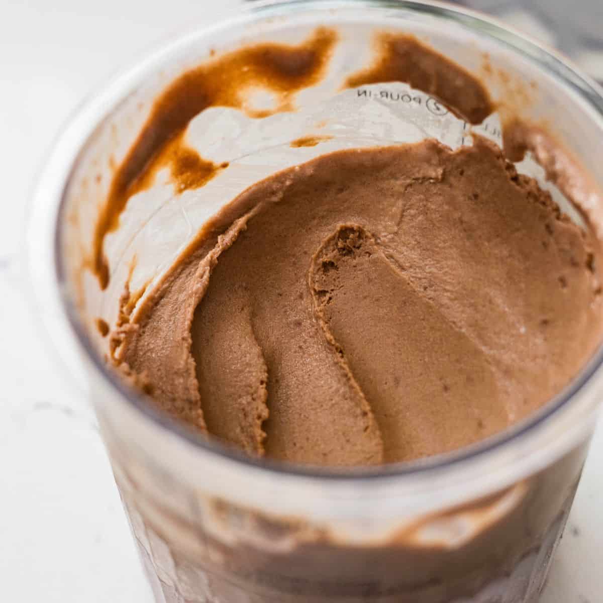 Creamy Ninja Creami rocky road ice cream after re-spinning in the pint container