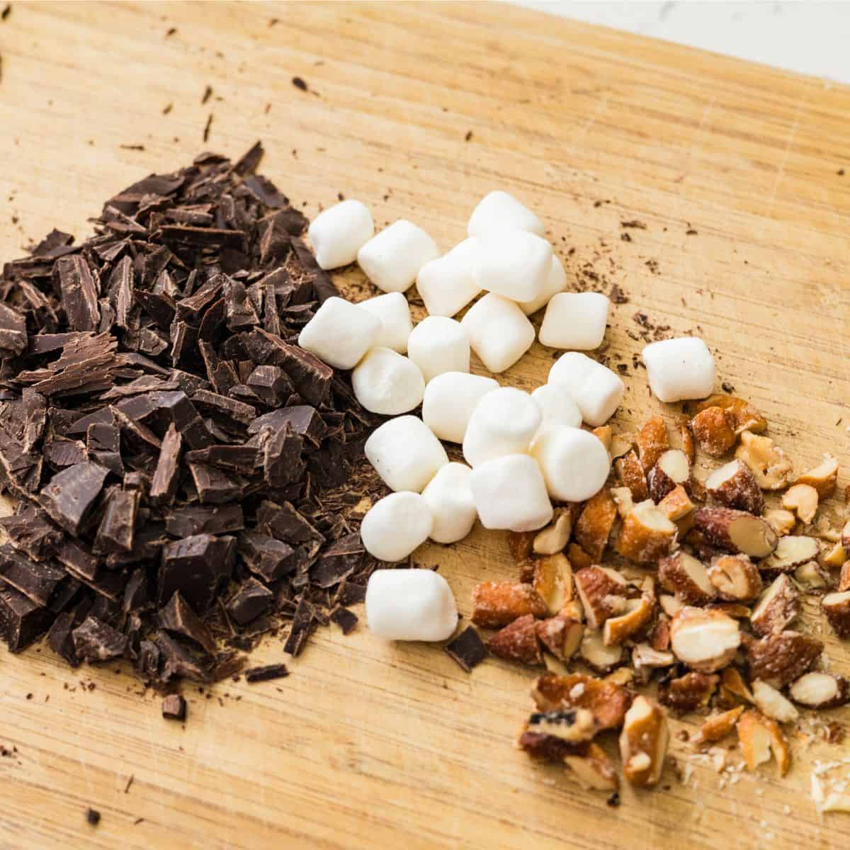 Chopped chocolate, mini marshmallows, and almonds for Ninja Creami rocky road ice cream