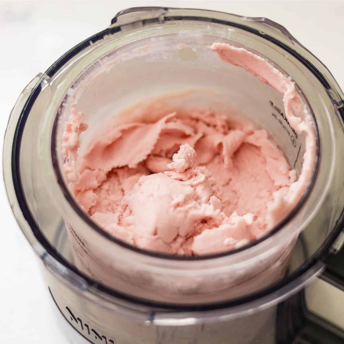 Ninja Creami strawberry protein frozen yogurt with a crumbly texture after respin