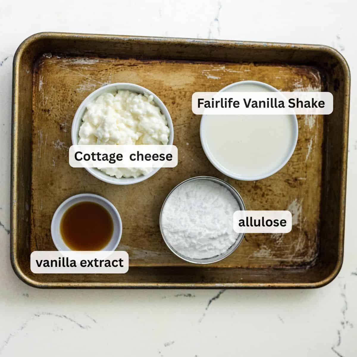 Ingredients for Ninja Creami protein ice cream including cottage cheese, Fairlife shake, vanilla, and allulose