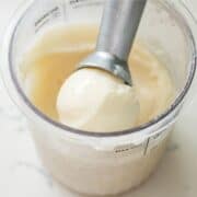 Scoop of creamy vanilla protein ice cream in a Ninja Creami pint